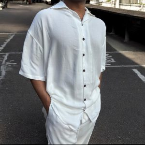 Oversized white short sleeve shirt made from breathable cotton