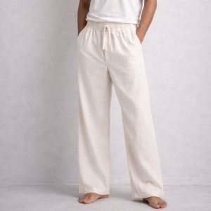 MAN WEARING OFF WHITE LINEN OVERSIZED PANT
