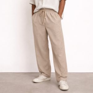 Close up of washed cotton fabric texture in greige grey beige tone