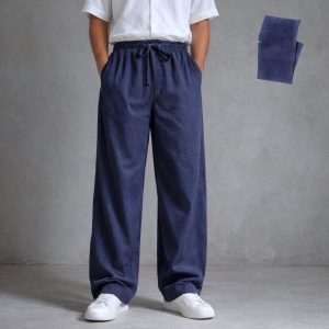 The Lans Oversized Dark Blue Long Pant is a confident expression of relaxed tailoring — clean in construction, generous in proportion, and grounded in deep tonal character.
