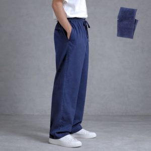 The Lans Oversized Dark Blue Long Pant is a confident expression of relaxed tailoring — clean in construction, generous in proportion, and grounded in deep tonal character.