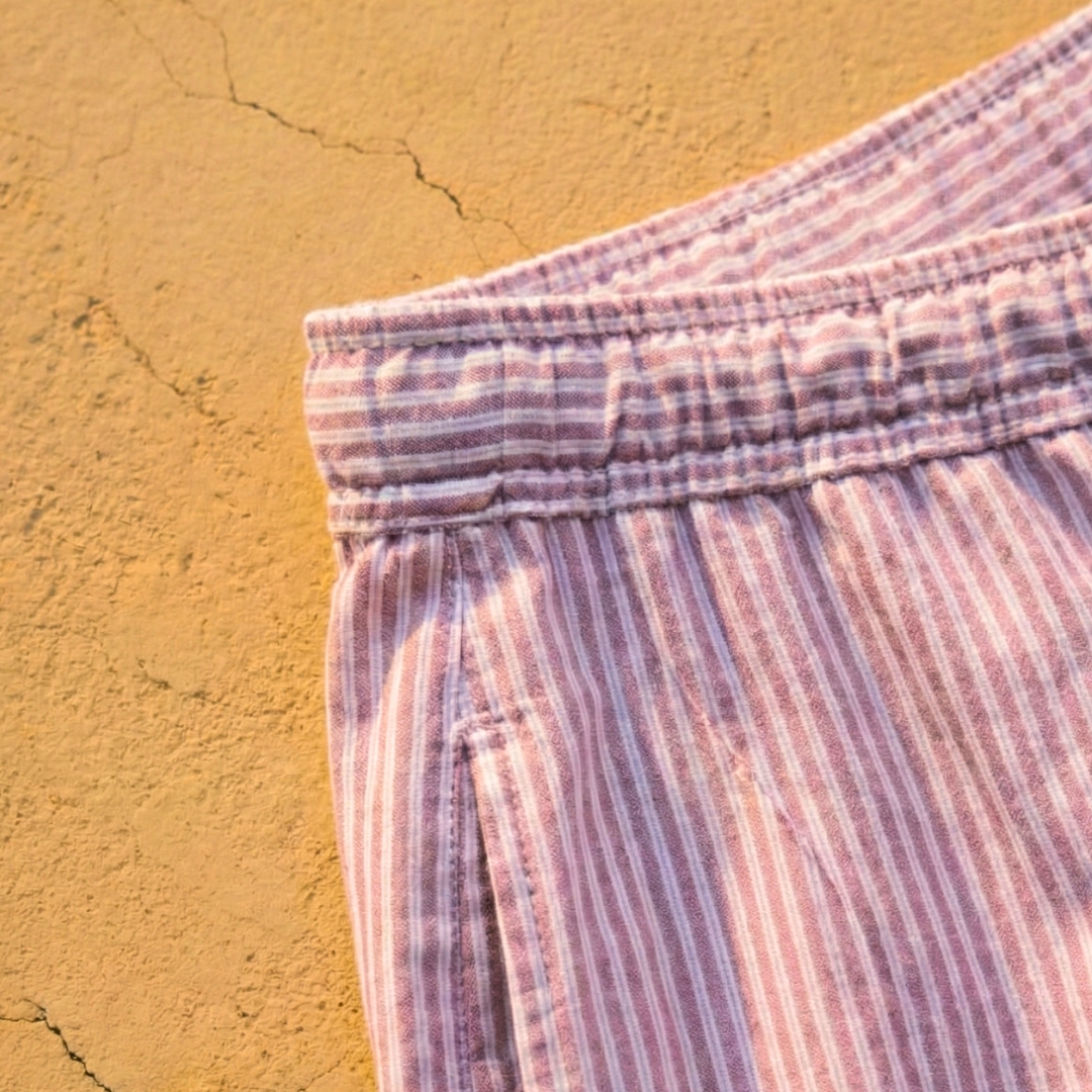 Woman wearing oversized striped matching outfit resort style made in Sri Lanka Breathable lightweight fabric texture of women's striped utility set