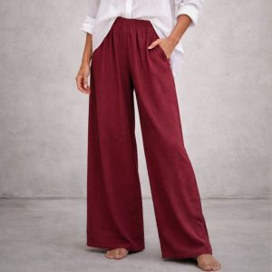 Model wearing loose fit textured cotton pants walking effortlessly