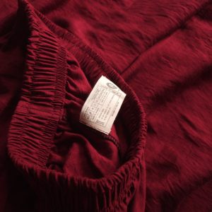 Model wearing loose fit textured cotton pants walking effortlessly