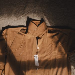 Man wearing mustard brown oversized long sleeve shirt resort style made in Sri Lanka