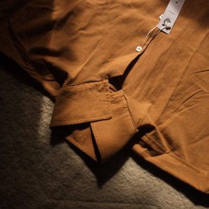 Man wearing mustard brown oversized long sleeve shirt resort style made in Sri Lanka