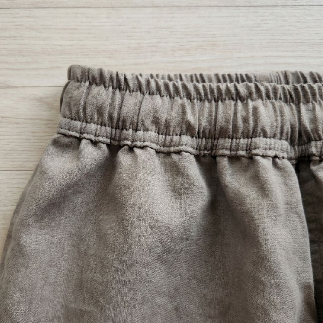 Close up of washed cotton fabric texture in greige grey beige tone Close up of washed cotton fabric texture in greige grey beige tone