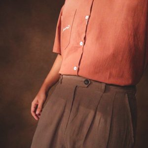 Close up of delicate Moroccan-inspired side embroidery on washed cotton shirt