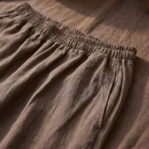 Close up of premium woven cotton fabric texture on women's trousers