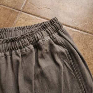 Close up of premium woven cotton fabric texture on women's trousers