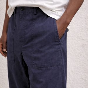 Oversized utility long pant with a relaxed fit, featuring a structured waistband, front utility pockets, and a straight wide-leg silhouette crafted for everyday comfort.