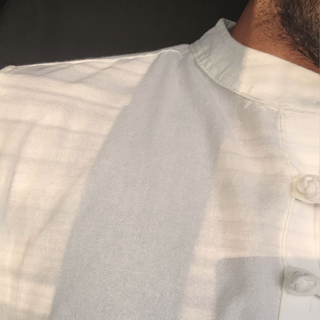 Man wearing breathable classic loopline shirt everyday comfort made in Sri Lanka Lans Relaxed Classic Washed Cotton Loopline Shirt front view mandarin collar