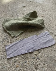 WOMEN WEARING OLIVE GREEN CUBAN SHORT SLEEVE SHIRT AND GREY LONG OVERSIZED PANT