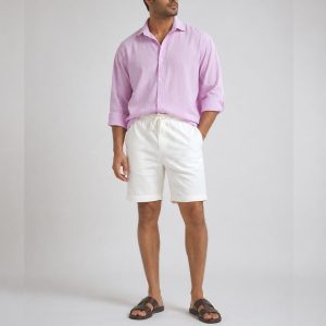 Lans Blush Coast Outfit with oversized washed light pink pointed collar shirt and off-white Wonderwall washed cotton short